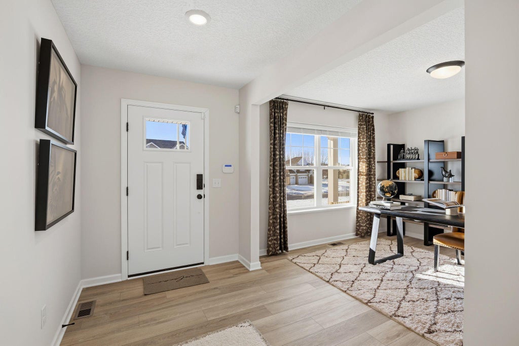 Photo of 10601 Glenbrook Avenue S, Cottage Grove, MN 55016 (MLS # 7157661)