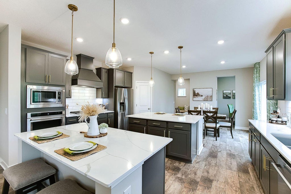 Photo of 1692 Oak Creek Pass, Chaska, MN 55318 (MLS # 7151142)