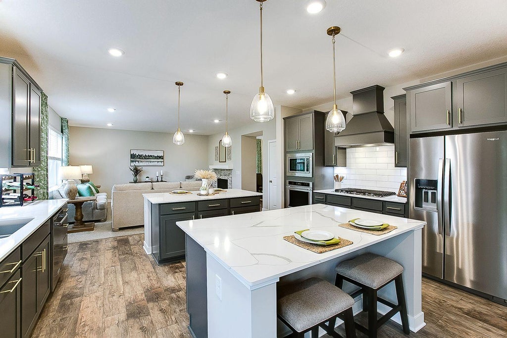 Photo of 1692 Oak Creek Pass, Chaska, MN 55318 (MLS # 7151142)