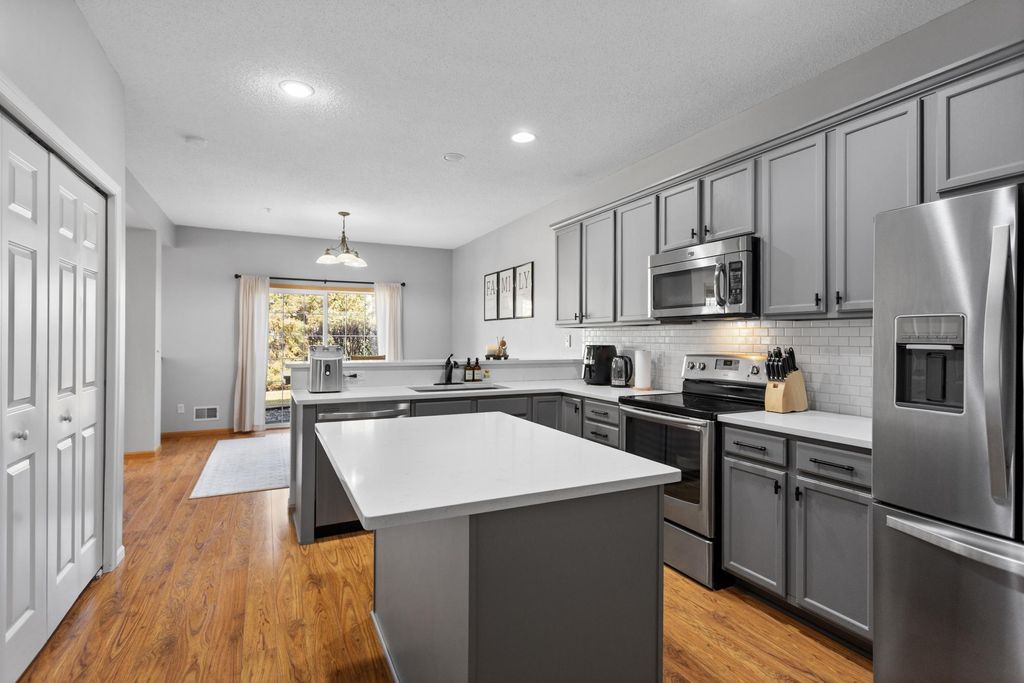 Photo of 1509 111th Drive NE #D, Blaine, MN 55449 (MLS # 7041490)