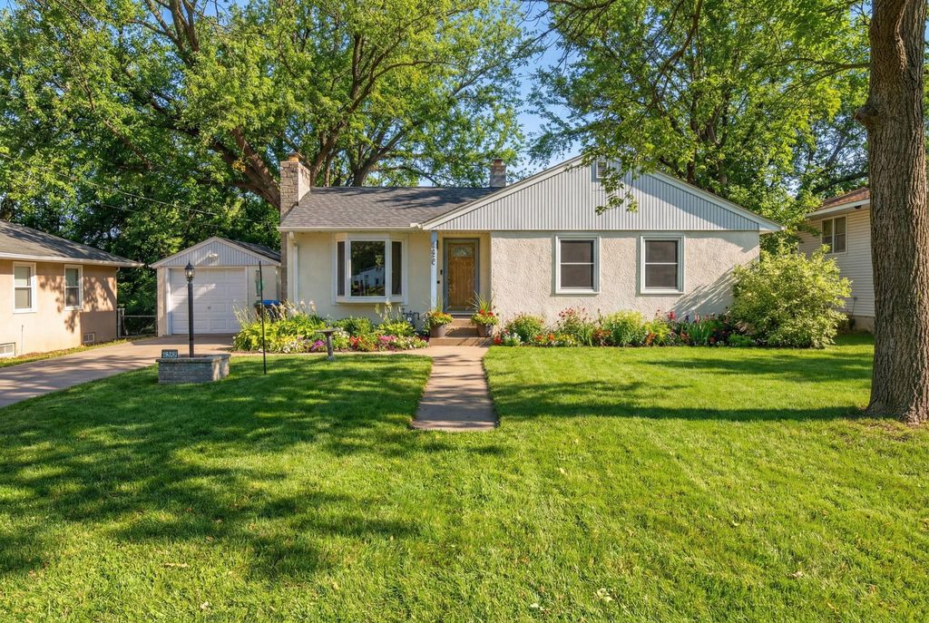 Photo of 2303 7th Avenue E, North Saint Paul, MN 55109 (MLS # 7040153)