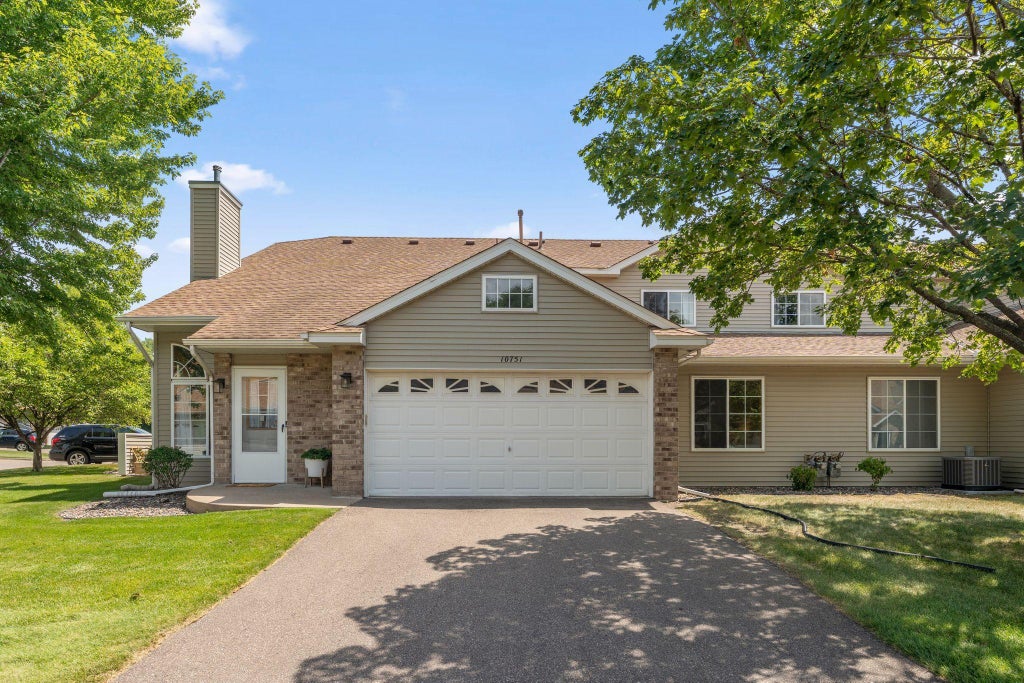 Photo of 10751 Redwood Street NW, Coon Rapids, MN 55433 (MLS # 7162262)
