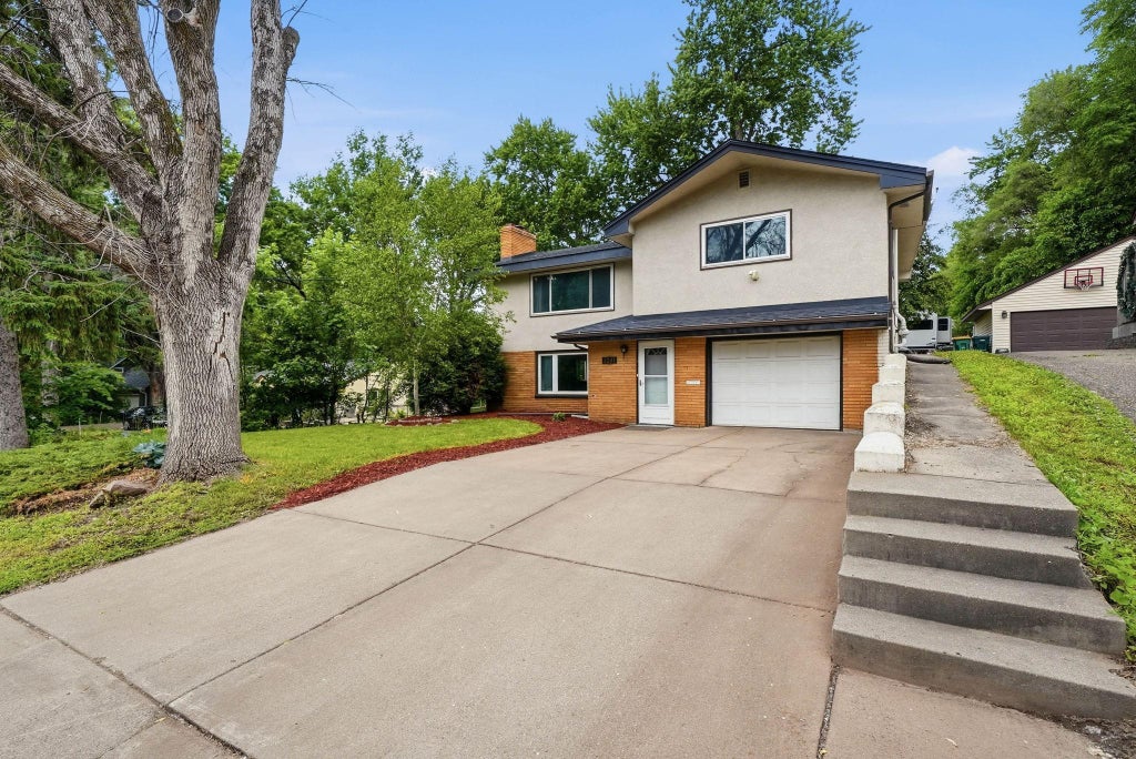 Photo of 1201 44th Avenue NE, Columbia Heights, MN 55421 (MLS # 7086232)