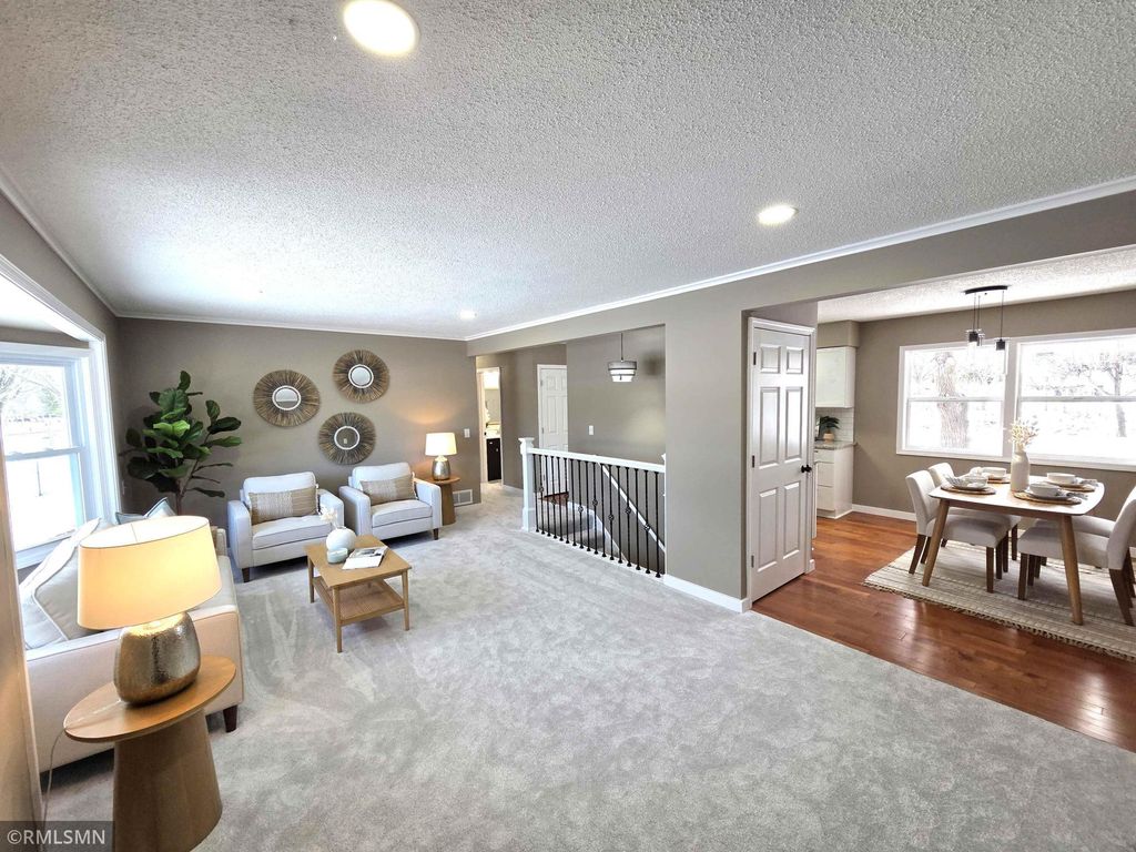 Photo of 11209 Independence Avenue N, Champlin, MN 55316 (MLS # 7007376)