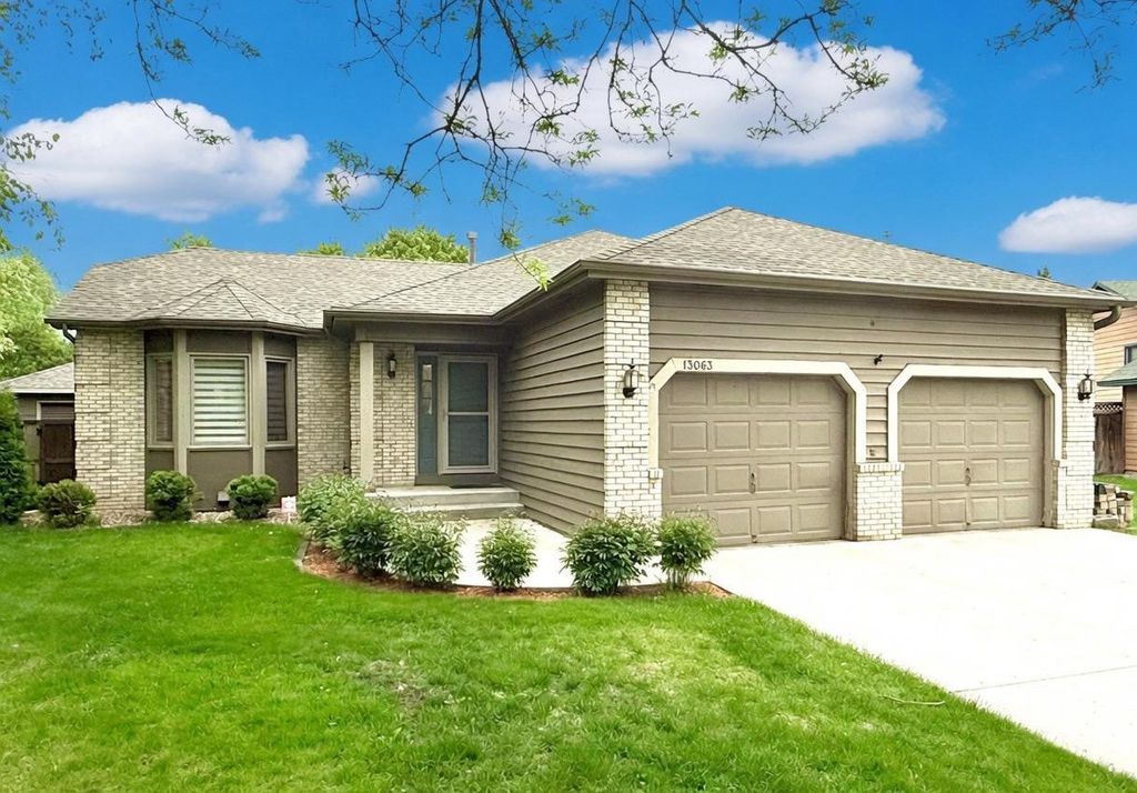 Photo of 13063 Arrowhead Street NW, Coon Rapids, MN 55448 (MLS # 7075834)