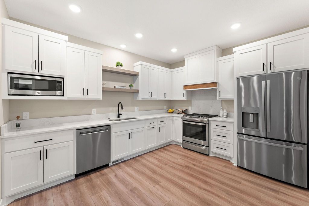 Photo of 2446 County Road D W, Roseville, MN 55112 (MLS # 7015198)