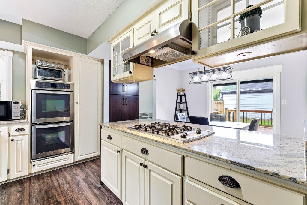 Photo of 817 Kenwood Lane, Maplewood, MN 55117 (MLS # 7164501)