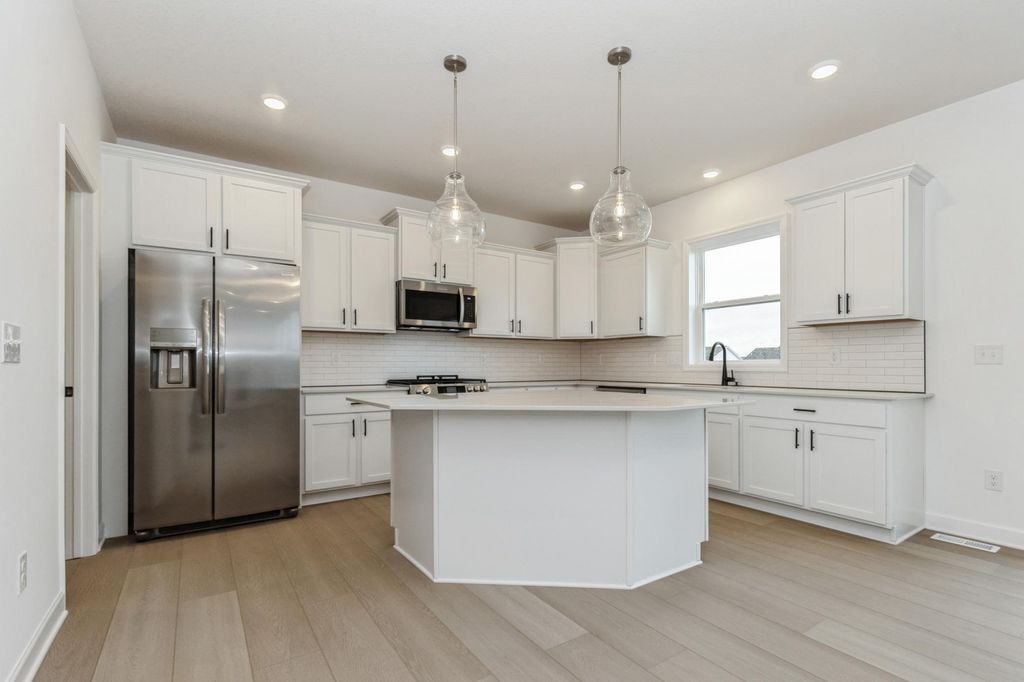 Photo of 879 149th Lane NW, Andover, MN 55304 (MLS # 7002394)