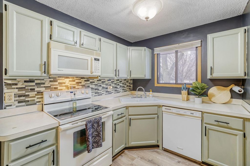 Photo of 12616 University Avenue NW, Coon Rapids, MN 55448 (MLS # 7039941)