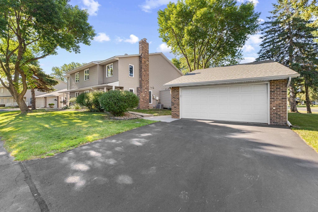 Photo of 9390 Ranchview Lane N, Maple Grove, MN 55369 (MLS # 7109896)