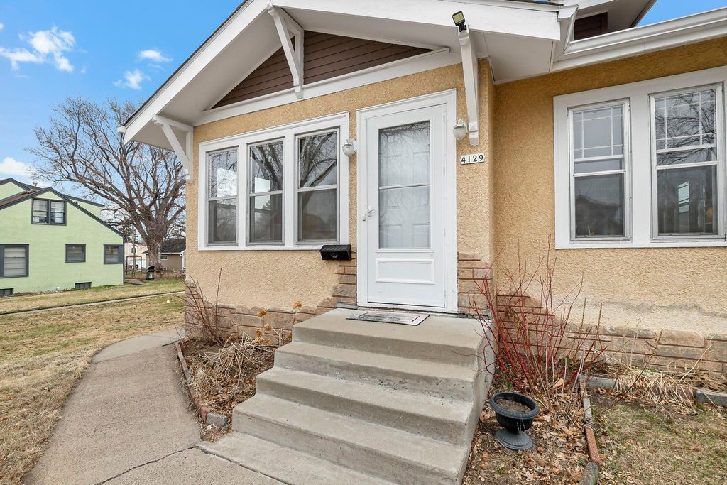 Photo of 4129 7th Street NE, Columbia Heights, MN 55421 (MLS # 7039033)