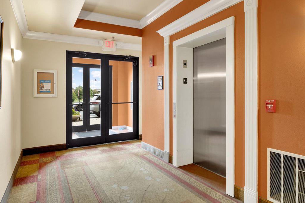 Photo of 10075 City Walk Drive #205, Woodbury, MN 55129 (MLS # 6817347)