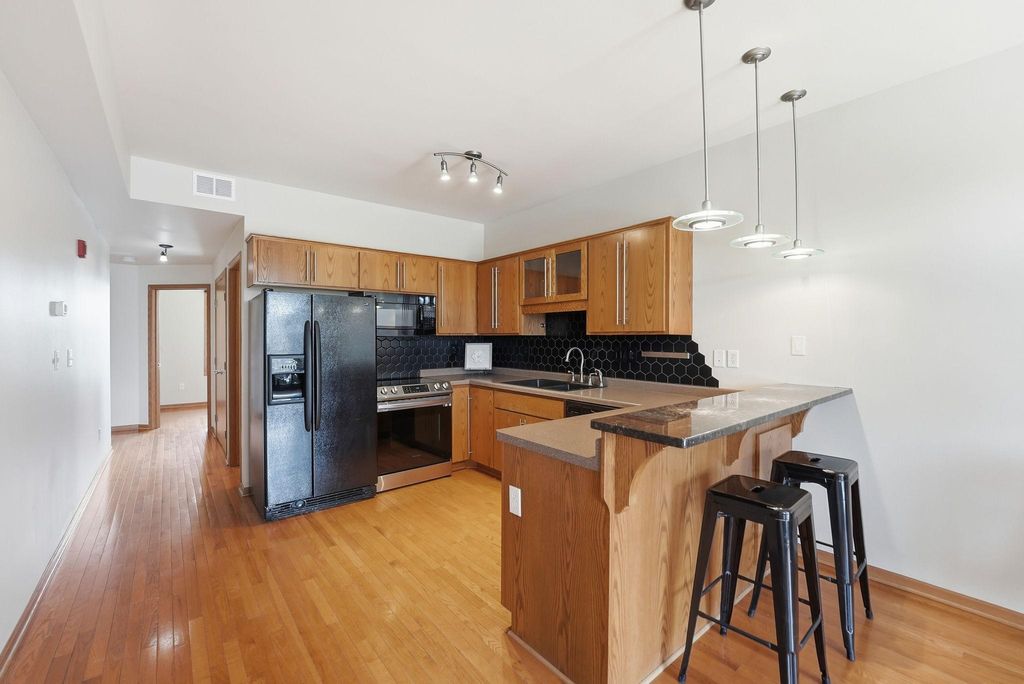Photo of 15 E Minnesota Street #211, Saint Joseph, MN 56374 (MLS # 7062063)