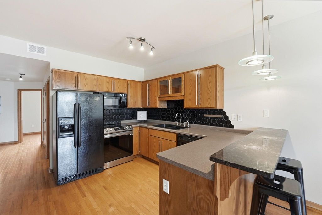 Photo of 15 E Minnesota Street #211, Saint Joseph, MN 56374 (MLS # 7062063)