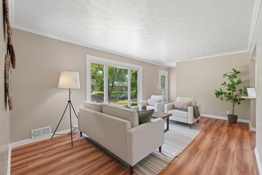 Photo of 761 Bartelmy Lane N, Maplewood, MN 55119 (MLS # 7083619)