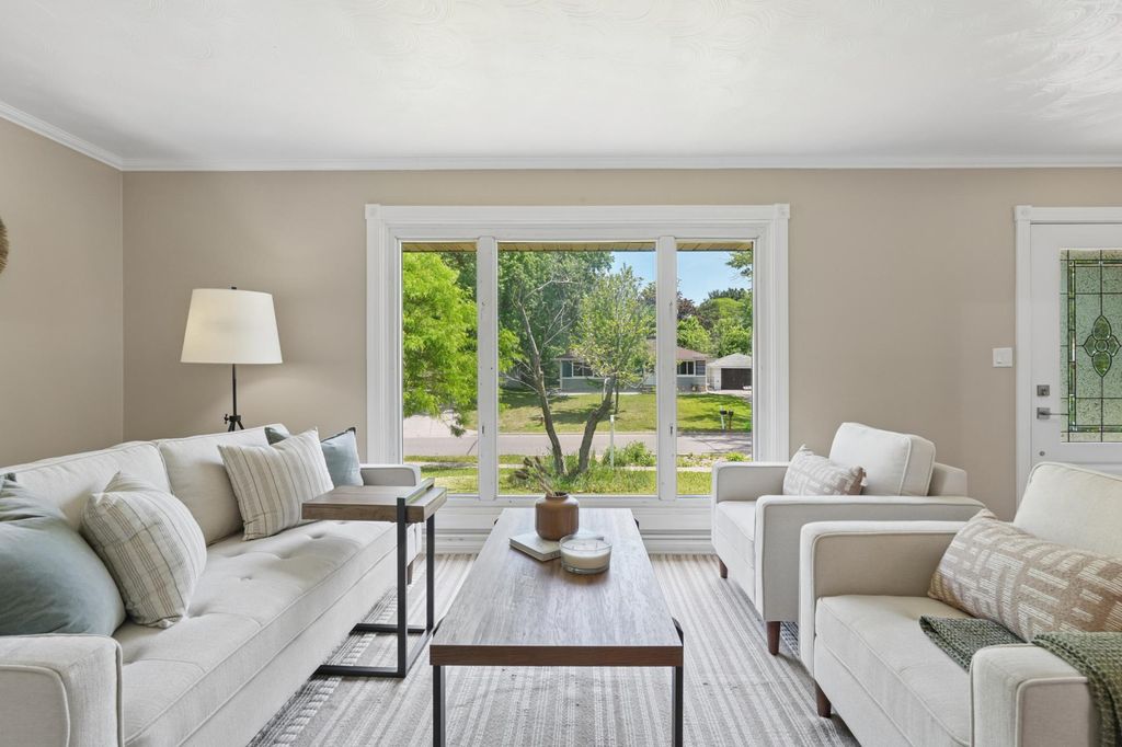 Photo of 761 Bartelmy Lane N, Maplewood, MN 55119 (MLS # 7083619)