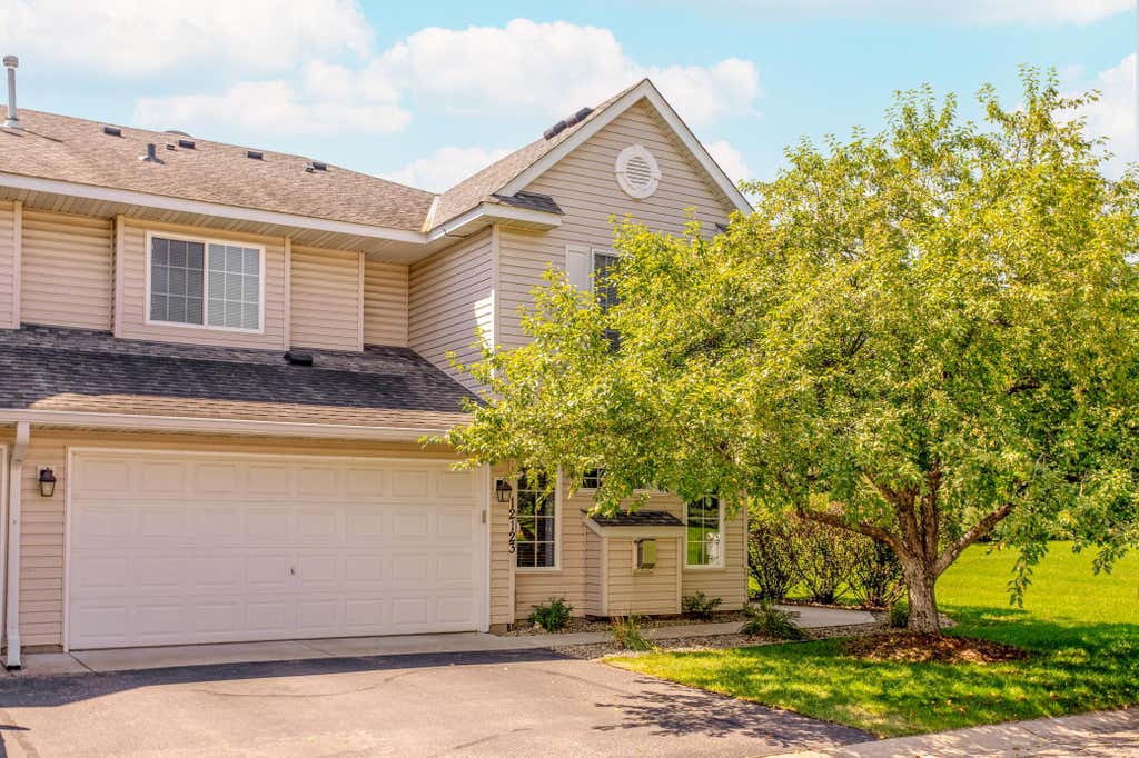 Photo of 12123 Zealand Avenue N, Champlin, MN 55316 (MLS # 7116630)