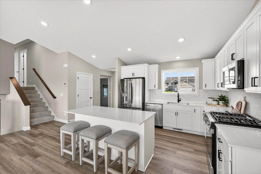 Photo of 913 Kepler Avenue NE, Hanover, MN 55341 (MLS # 7167378)