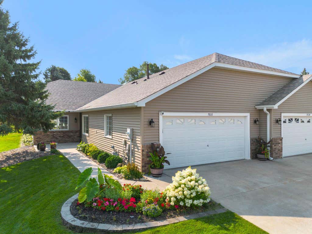 Photo of 7632 Newbury Road, Woodbury, MN 55125 (MLS # 7111226)
