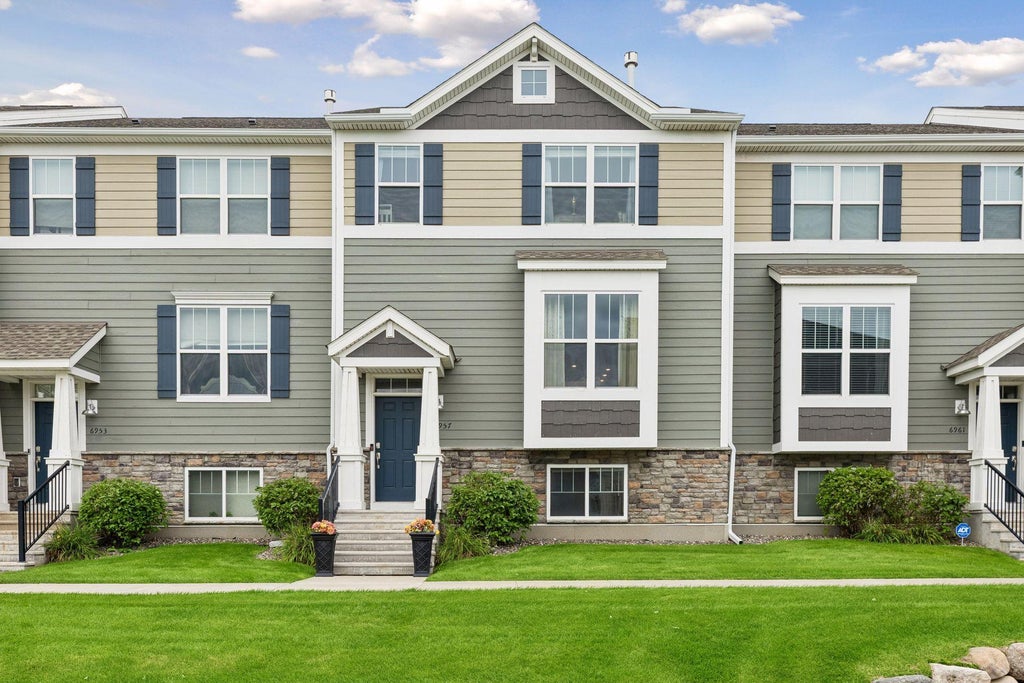 Photo of 6957 W Locke Pointe Drive NE, Fridley, MN 55432 (MLS # 7152395)