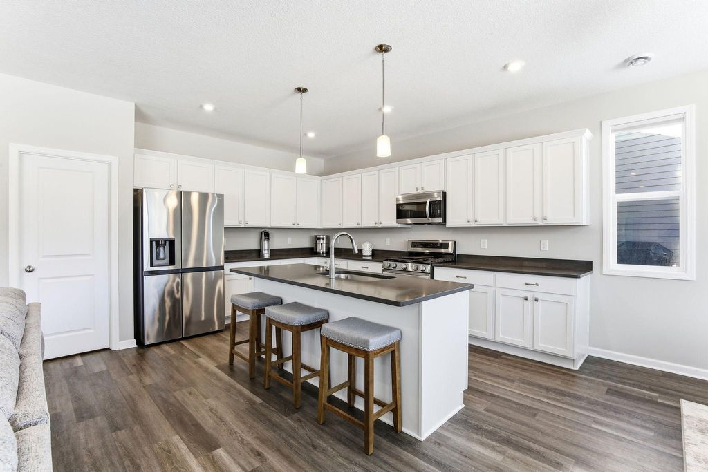 Photo of 9931 Bluebird Street NW, Coon Rapids, MN 55433 (MLS # 7032248)