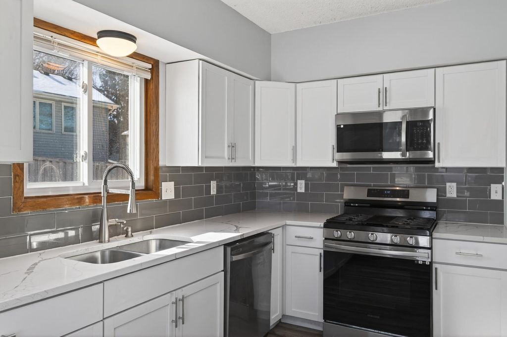 Photo of 2810 Hillvale Trail, Oakdale, MN 55128 (MLS # 7029860)