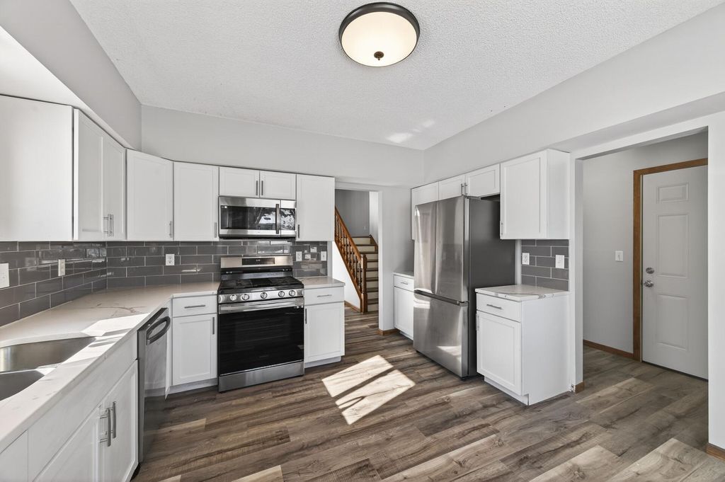 Photo of 2810 Hillvale Trail, Oakdale, MN 55128 (MLS # 7029860)