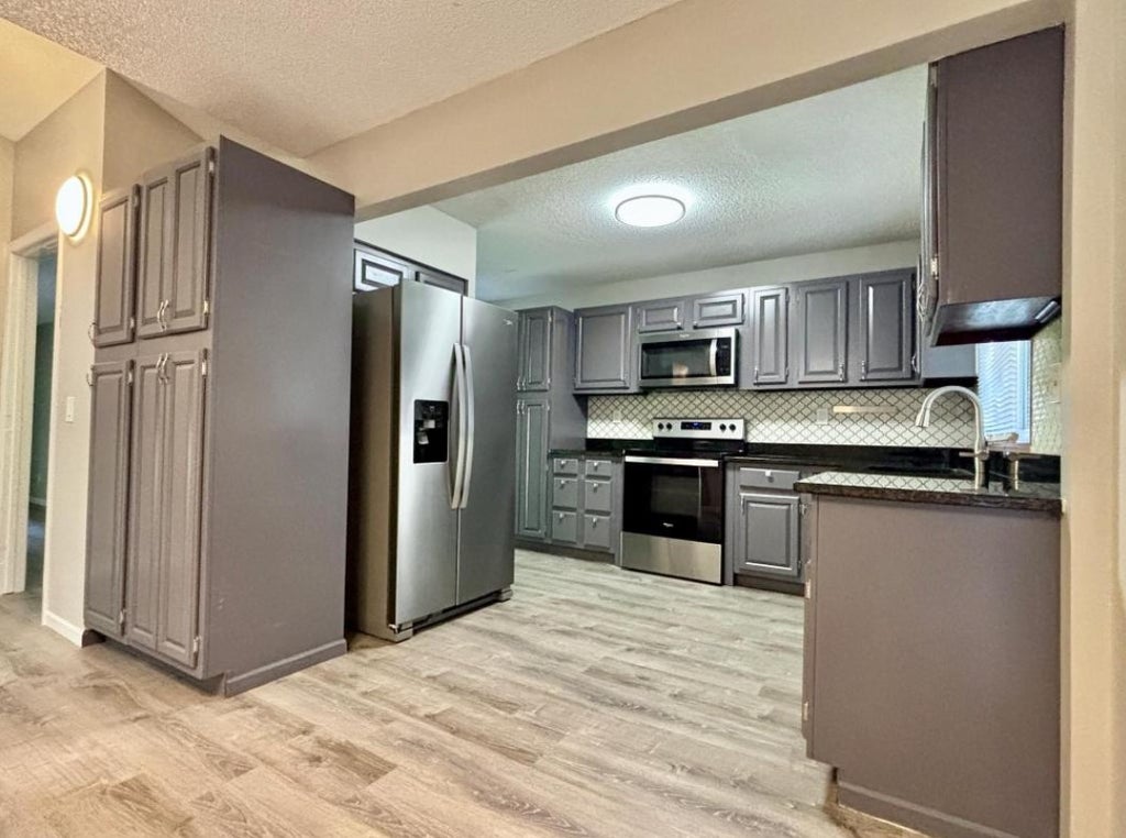 Photo of 1414 W Danube Road, Fridley, MN 55432 (MLS # 7159716)