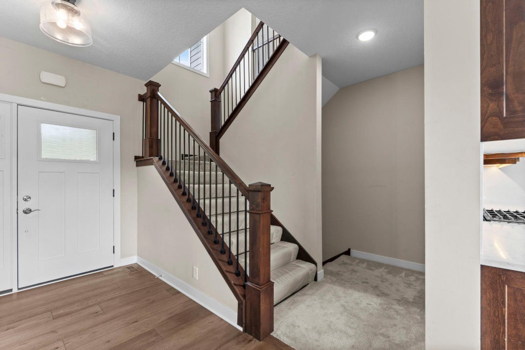 Photo of 11975 Castle Rock Court N, Champlin, MN 55316 (MLS # 7148234)