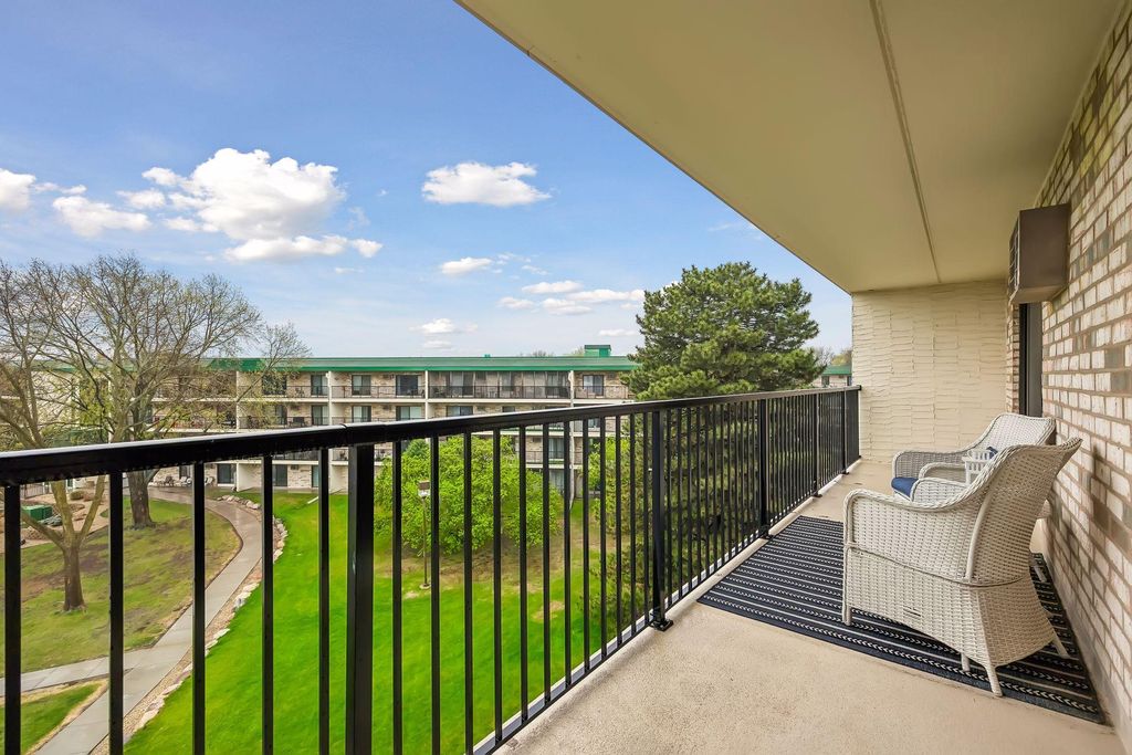 Photo of 10411 Cedar Lake Road #515, Hopkins, MN 55305 (MLS # 7063525)