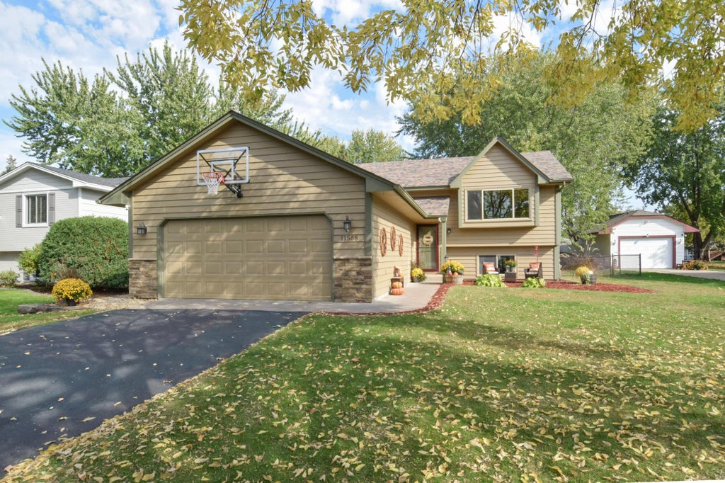 Photo of 11558 Xylon Avenue N, Champlin, MN 55316 (MLS # 7158511)