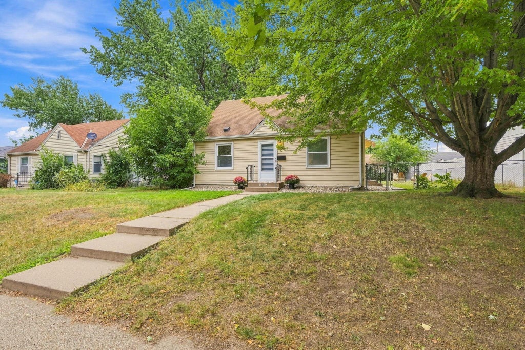 Photo of 4716 Washburn Avenue N, Minneapolis, MN 55430 (MLS # 7133885)