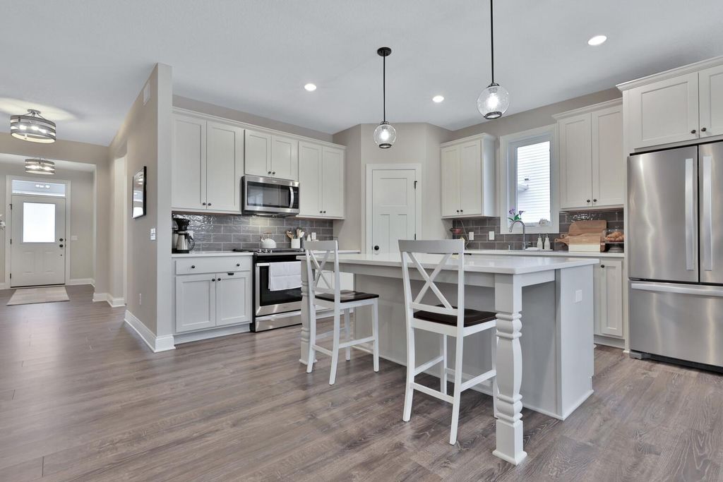 Photo of 4731 127th Lane NE, Blaine, MN 55449 (MLS # 7048291)