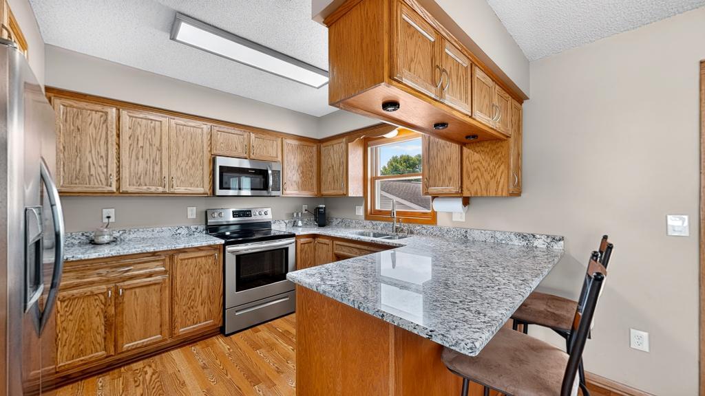 Photo of 5113 19 1/2 Avenue Lane NW, Rochester, MN 55901 (MLS # 7130392)