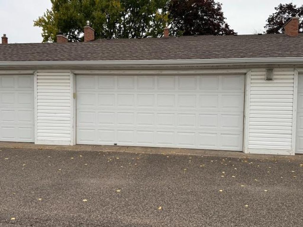 Photo of 2002 Arkwright Street, Maplewood, MN 55117 (MLS # 7011618)