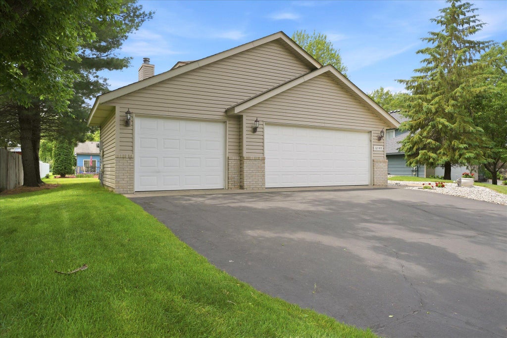 Photo of 12140 Jonquil Street NW, Coon Rapids, MN 55433 (MLS # 7086010)