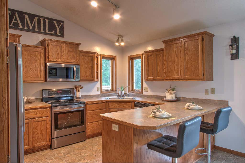 Photo of 1384 Cedar Drive S, Cambridge, MN 55008 (MLS # 7119479)