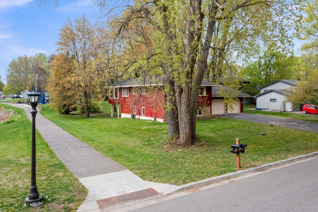 Photo of 722 Parkview Lane N, Champlin, MN 55316 (MLS # 7049494)