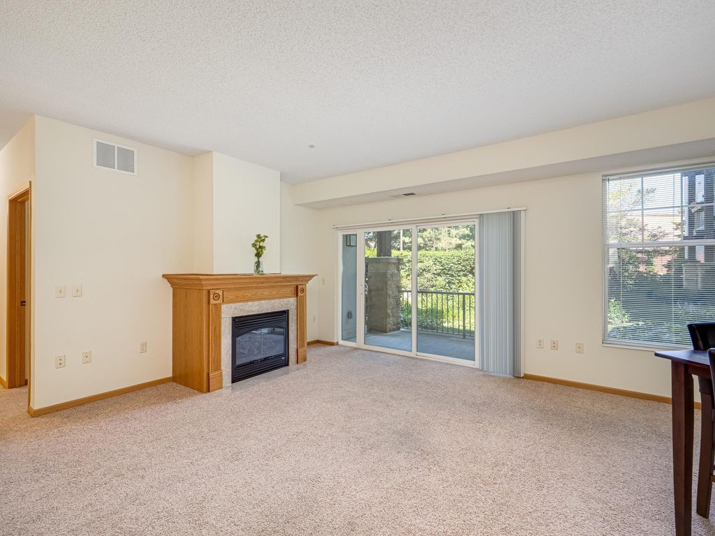 Photo of 1900 Rush Lake Trail #110, New Brighton, MN 55112 (MLS # 7001107)