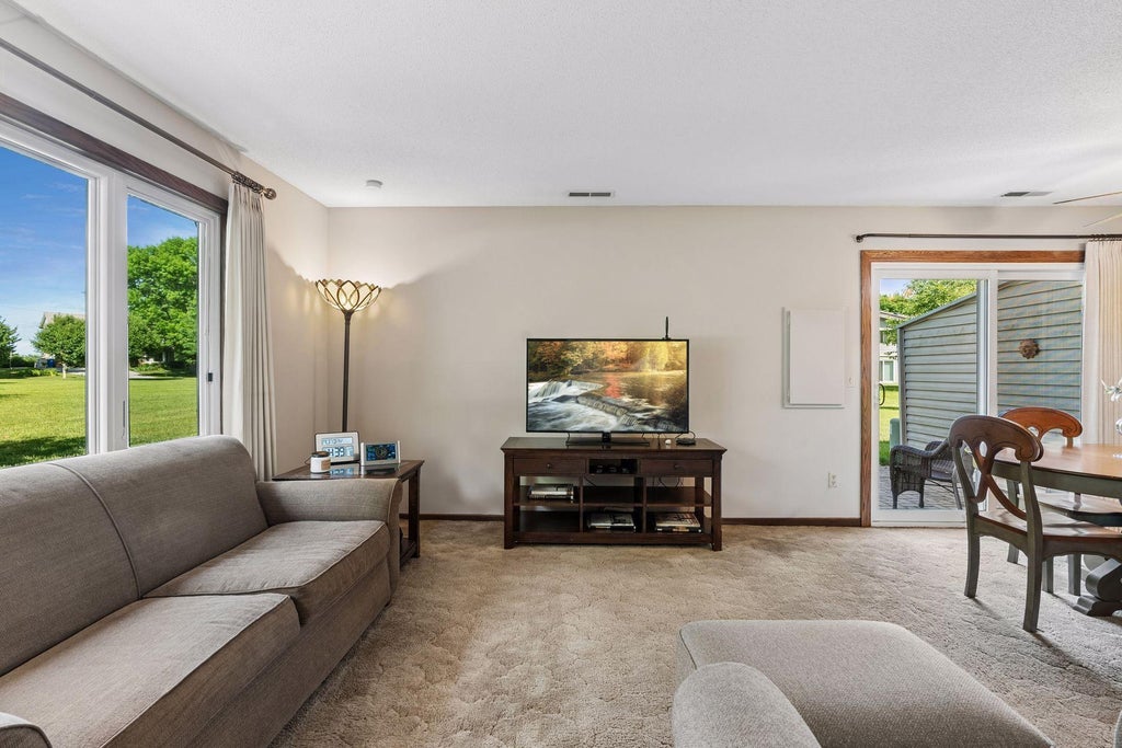 Photo of 9558 Kingsview Lane N, Maple Grove, MN 55369 (MLS # 7089537)