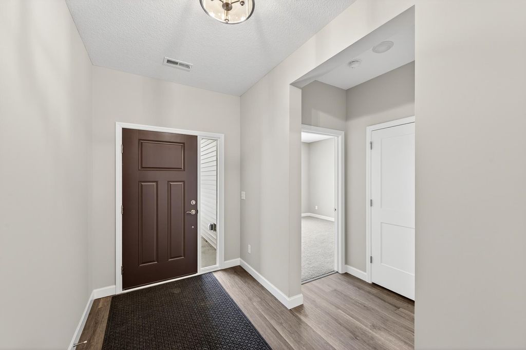 Photo of 1500 Victory Lane NE, Isanti, MN 55040 (MLS # 7016966)