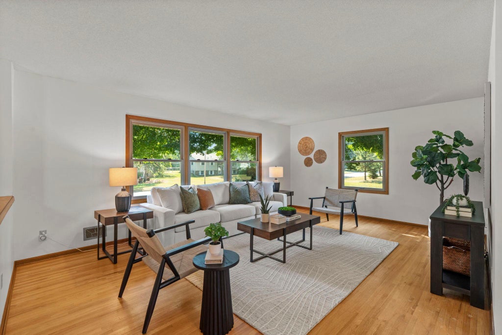Photo of 11301 Welcome Avenue N, Champlin, MN 55316 (MLS # 7101432)