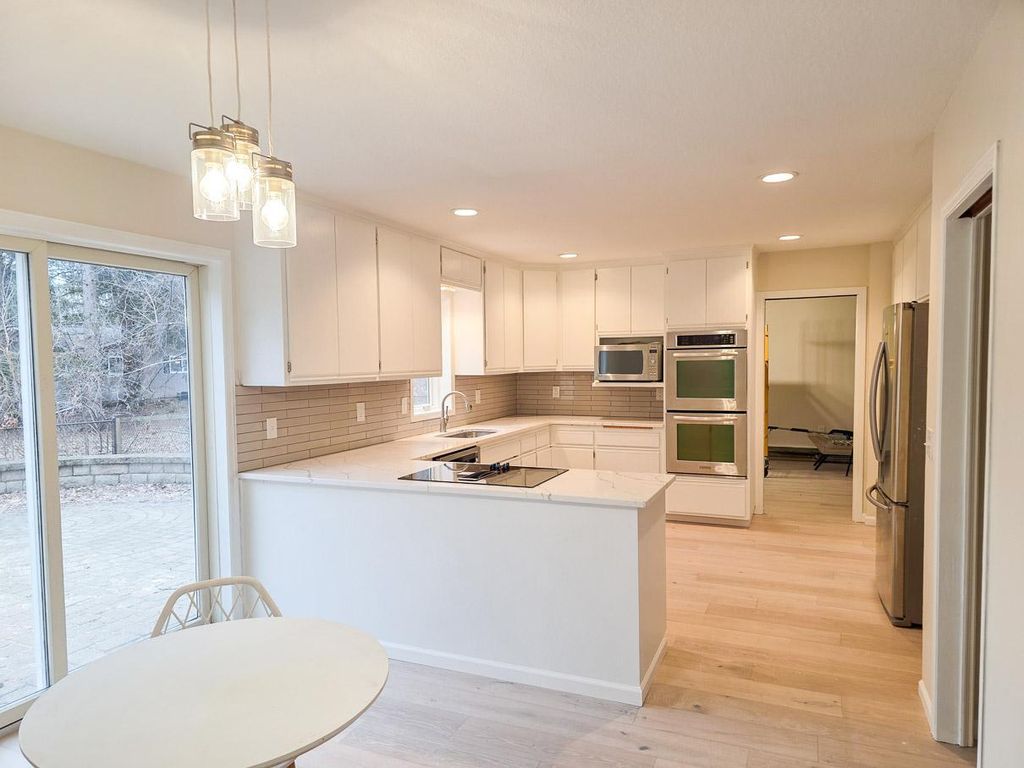 Photo of 835 Vicksburg Lane N, Plymouth, MN 55447 (MLS # 7043173)