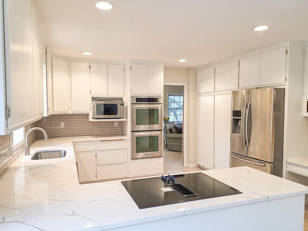 Photo of 835 Vicksburg Lane N, Plymouth, MN 55447 (MLS # 7043173)