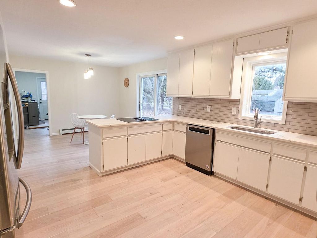 Photo of 835 Vicksburg Lane N, Plymouth, MN 55447 (MLS # 7043173)