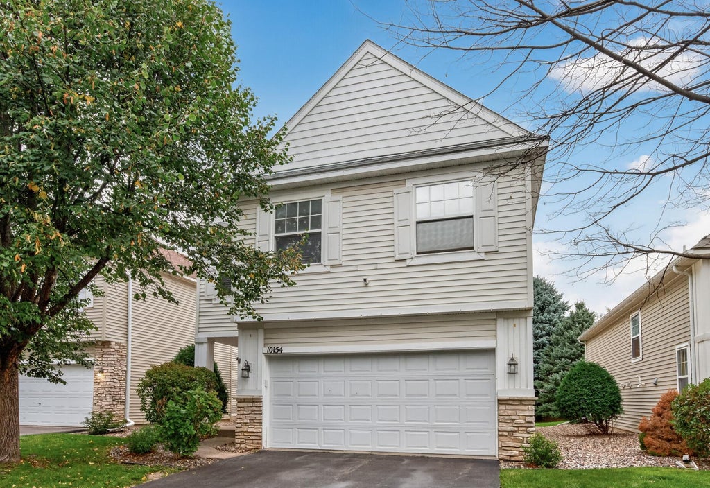 Photo of 10154 Country Club Curve, Woodbury, MN 55129 (MLS # 7151430)