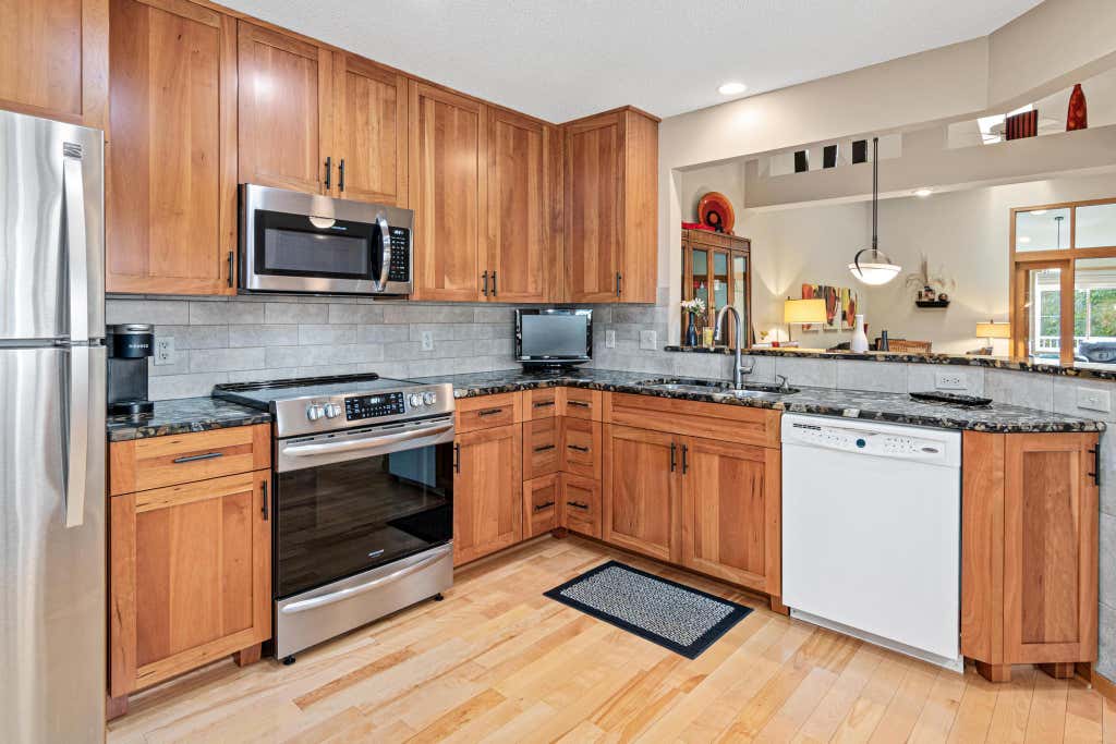 Photo of 9316 Kimberly Lane N, Maple Grove, MN 55311 (MLS # 7126963)