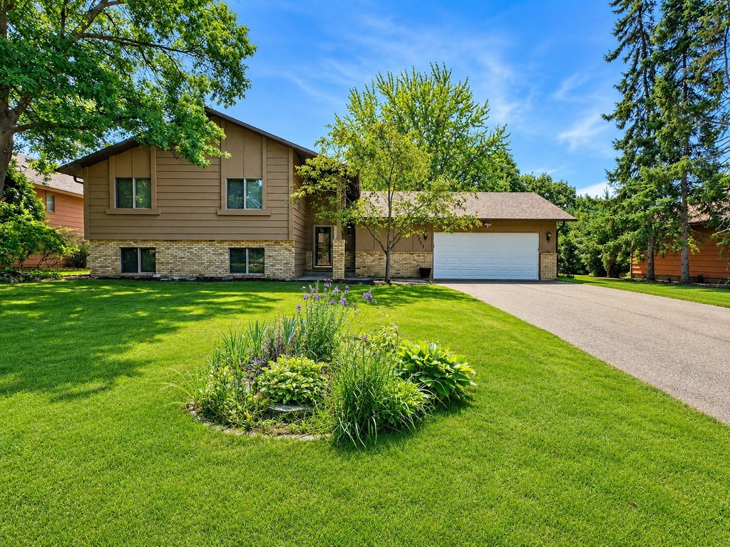 Photo of 11963 NW Evergreen Street NW, Coon Rapids, MN 55448 (MLS # 7137928)