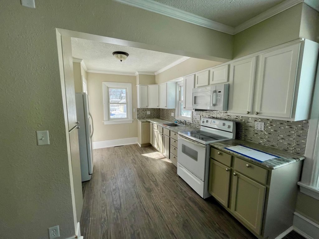 Photo of 911 W Cavour Avenue, Fergus Falls, MN 56537 (MLS # 7044244)