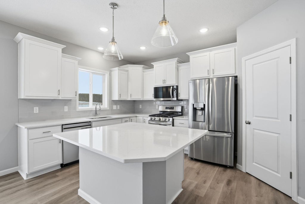 Photo of 921 Buffalo Street NW, Delano, MN 55328 (MLS # 7138709)